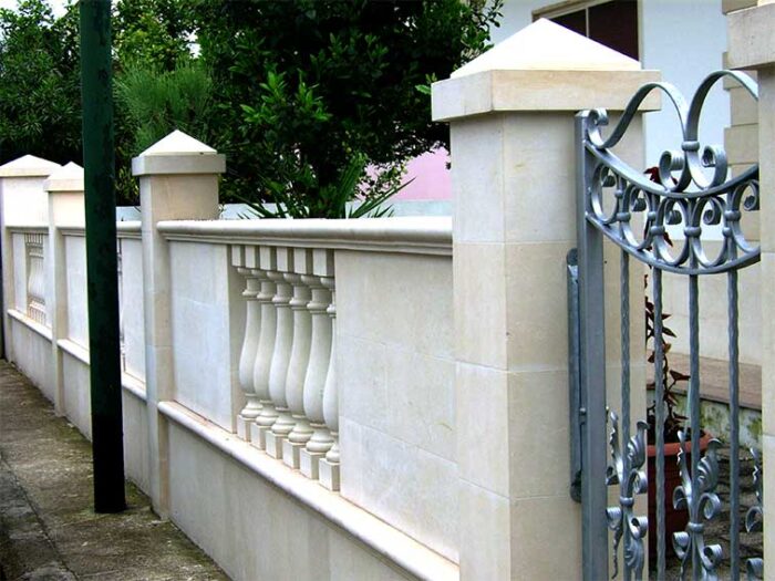 stone wall with balustrade and pillars